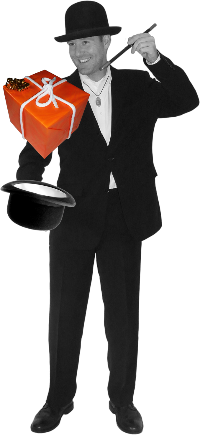 Wittich Wolf zaubert ein rotes Geschenk aus einem Hut